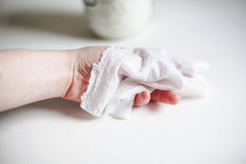 Use water and cloth wipes to clean bab